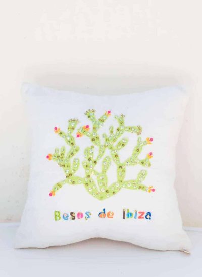 embroidered cactus with a besos de ibiza message on a cushion