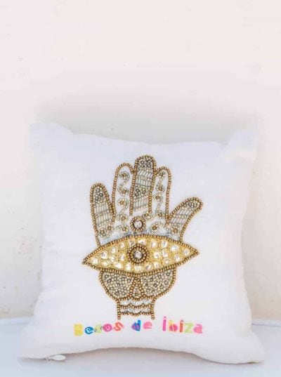 cushion with an embroidered hand of Hamsa