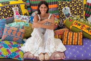 Vibrant colorful patchwork pillows at La Galeria Elefante, showcasing unique handmade textiles and artisan craftsmanship, perfect for boho home decor and interior design enthusiasts.