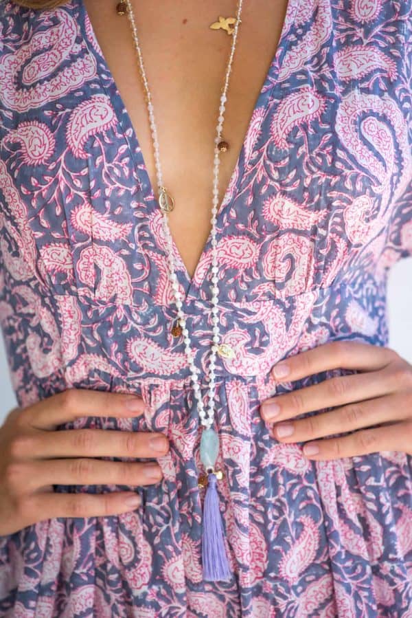 long beaded necklace with lilac tassel