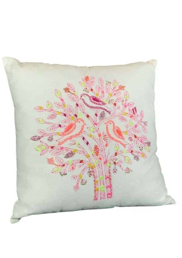 pink embroidered tree with birds on a white cushion