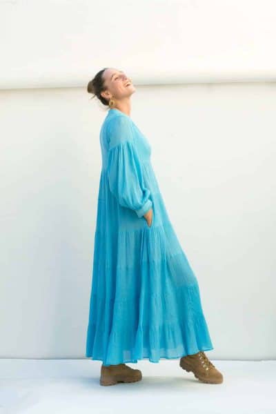 ankle length sky blue dress with long sleeves and pockets