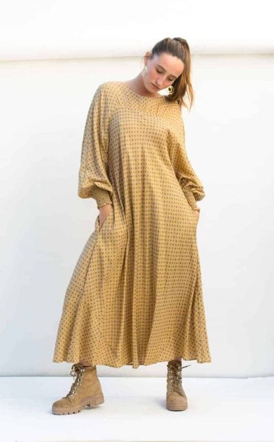 yellow print midi length dress with long sleeves and pockets