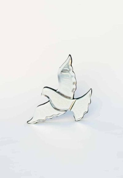 glass mirror in the shape of a dove