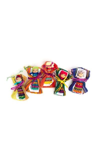 Colourful dolls sleeping on Guatemalan fabric