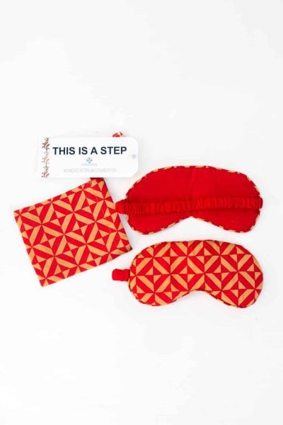 red geometric print silk eye mask with matching bag