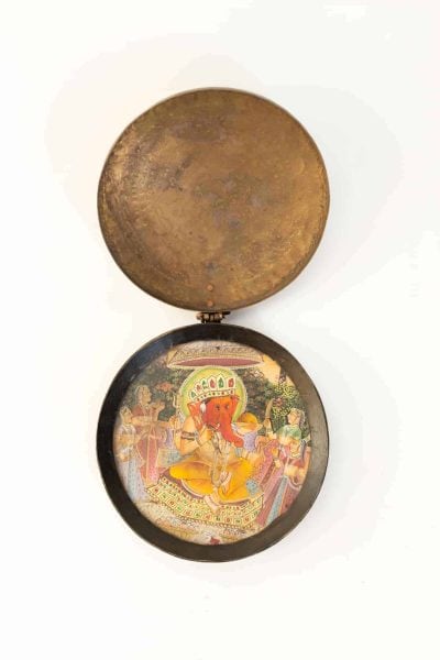 portable brass shrine with Ganesha painted on glass