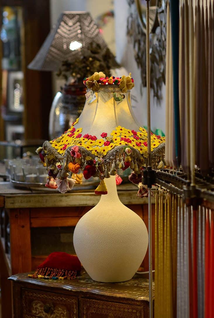 Colorful vintage lampshade decorated with flowers at La Galeria Elefante.