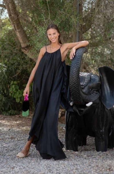 black silk dress with velvet purse
