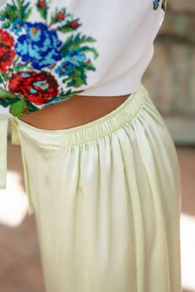 waistband on pale green silk trousers