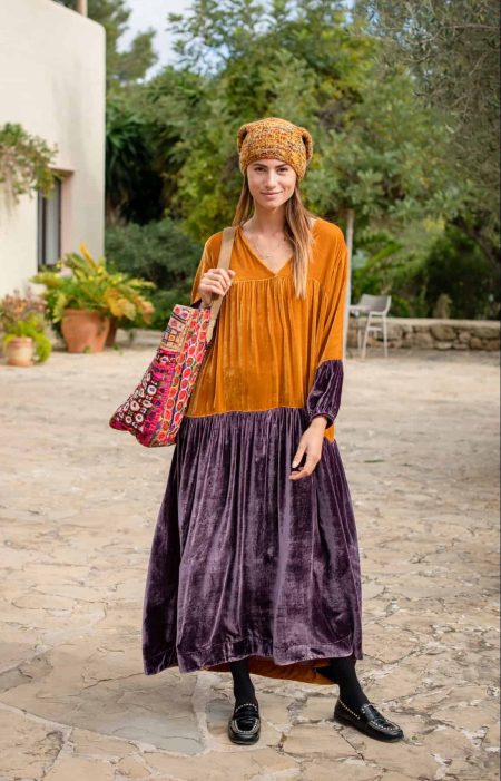 Velvet Planet Dress - La Galeria Elefante Ibiza two-tone long velvet dress with long sleeves worn by a model with a hat on