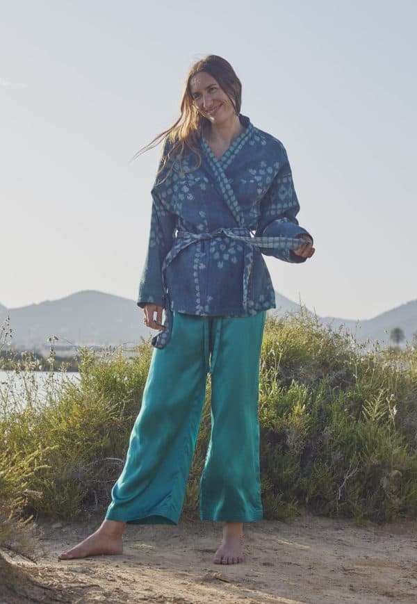teal silk trousers with blue jacket