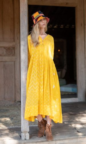 yellow jacq dress velvet bucket hat la galeria elefante ibiza 160 gypsy westwood photography caroline and unai scaled e1743092044343 1