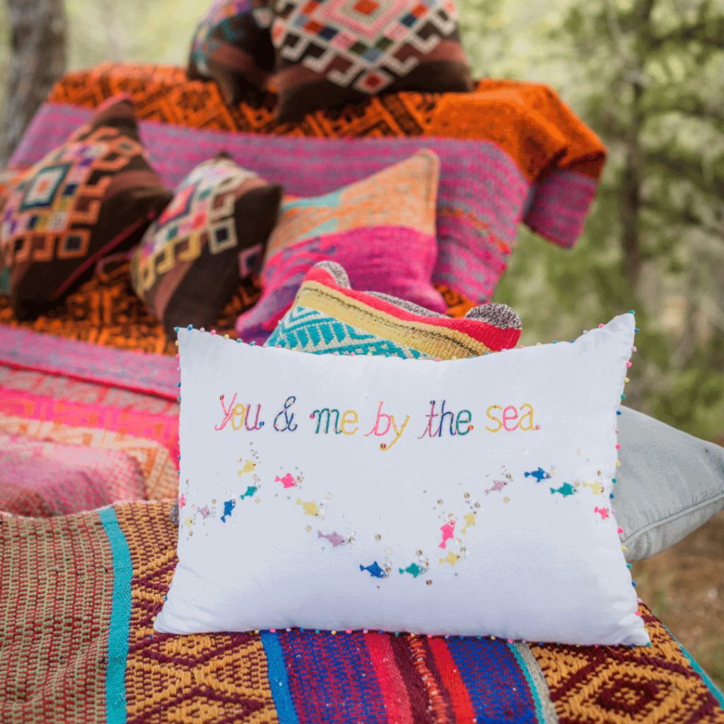 Colourful embroidered cushion from La Galeria Elefante, you me by the sea motif